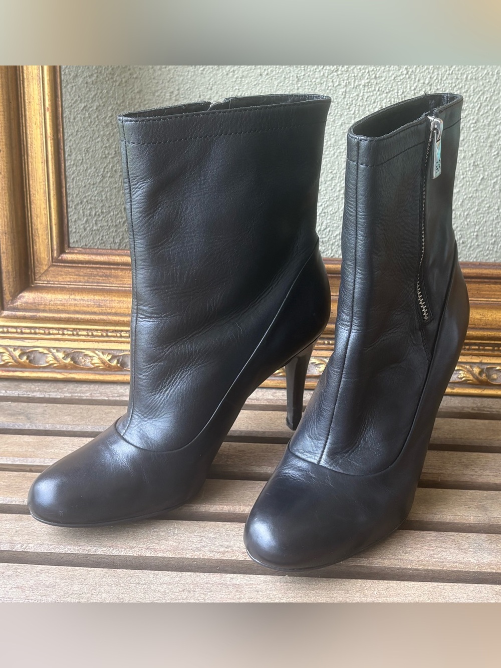 Women's coach Black Leather above Ankle stiletto Boots zipper size 7. EUC.
